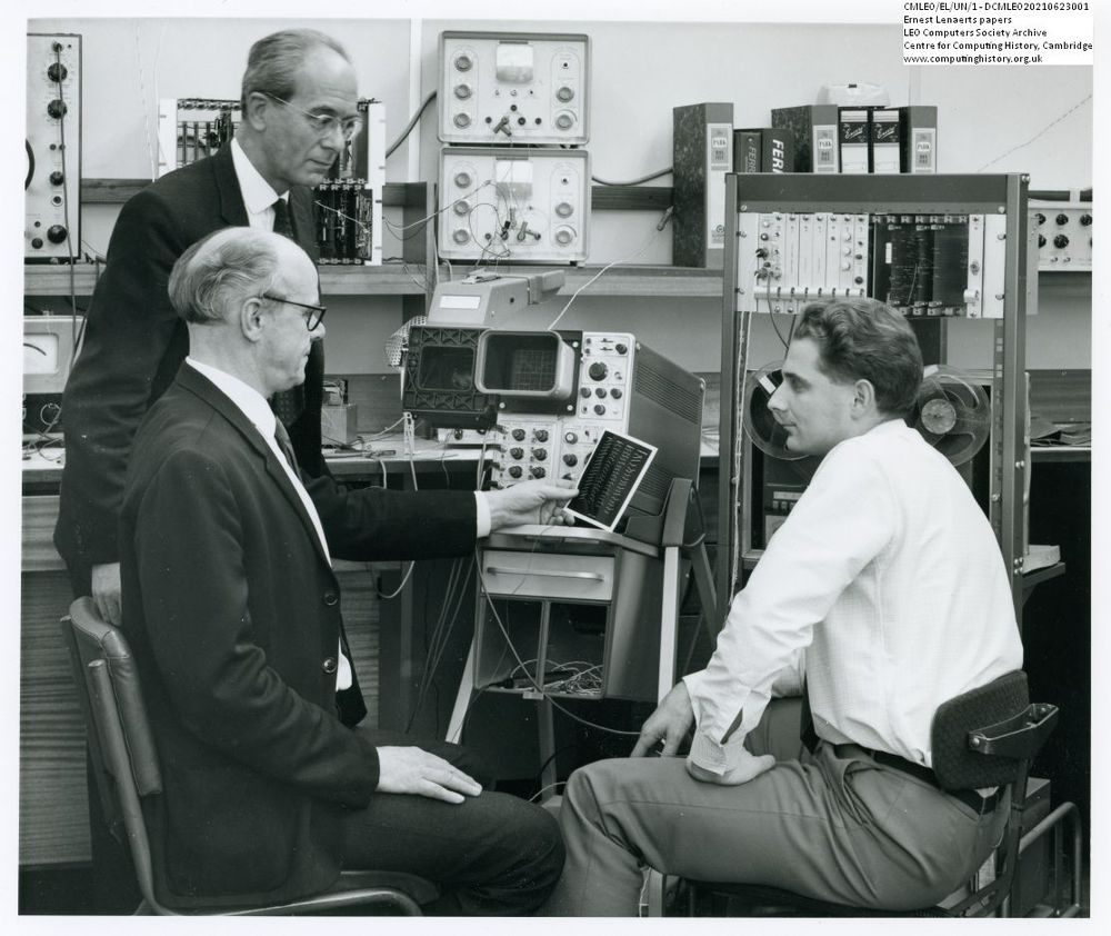 Photograph of 64070 Photo of Ernest Lenaerts, D.W. Boston and Michael Underwood with ICL speech recognizer