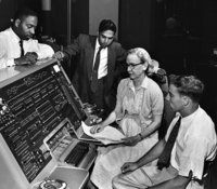 Grace Hopper completes the A-0 compiler