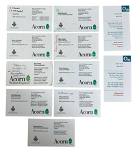 Collection of Acorn and OM Business Cards