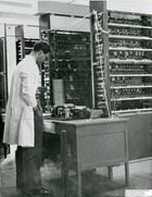 60495 Ernest Lenaerts looking at a LEO I teleprinter