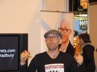 Jason Bradbury signs his book ...